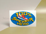 <img src=”Oval-Stickers.jpg” alt=”Custom Oval Stickers with blue color and a sneaker on the background and "100% SNEAKER HEAD" text in center”>