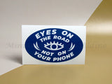 <img src=”Custom-Printed-Oval-Stickers-and-Labels.jpg” alt=”Custom Oval Stickers with blue background and EYES ON THE ROAD NOT ON YOUR PHONE" white text in center”>