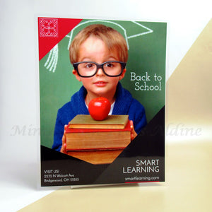 <img src=”Laminating-Poster-Printing.jpg” alt=”Custom Posters with Lamination with an image of a boy wearing glasses and several books in his hands”>