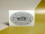 <img src=”Oval-Stickers-Cheap-Oval-Sticker.jpg” alt=”Custom Oval Stickers with gray color and a car on the background and "FAST CAR CLUB" text in center”>